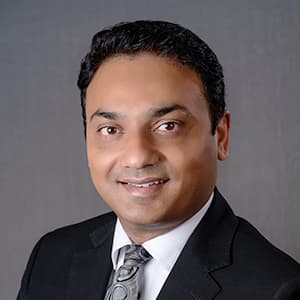 Aman, Senior Financial Advisor